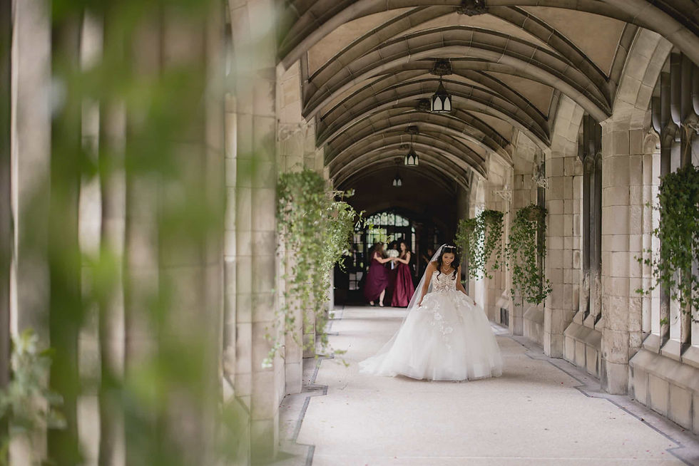 Architectural wedding portraits in the Knox College courtyard by a Toronto wedding photographer.