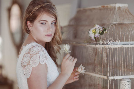 toronto-editorial-wedding-photography-Delicate editorial bridal portrait featuring a bride with soft features and lace details, posing thoughtfully in Toronto.