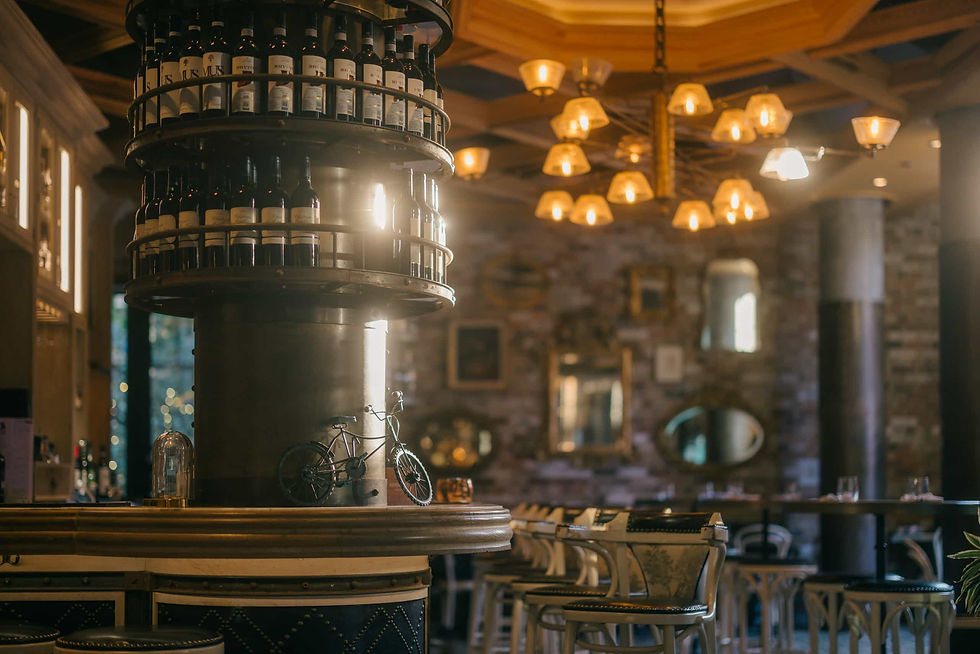 The stylish, Parisian-inspired dining room interior of Cluny Bistro, perfect for an intimate wedding reception.
