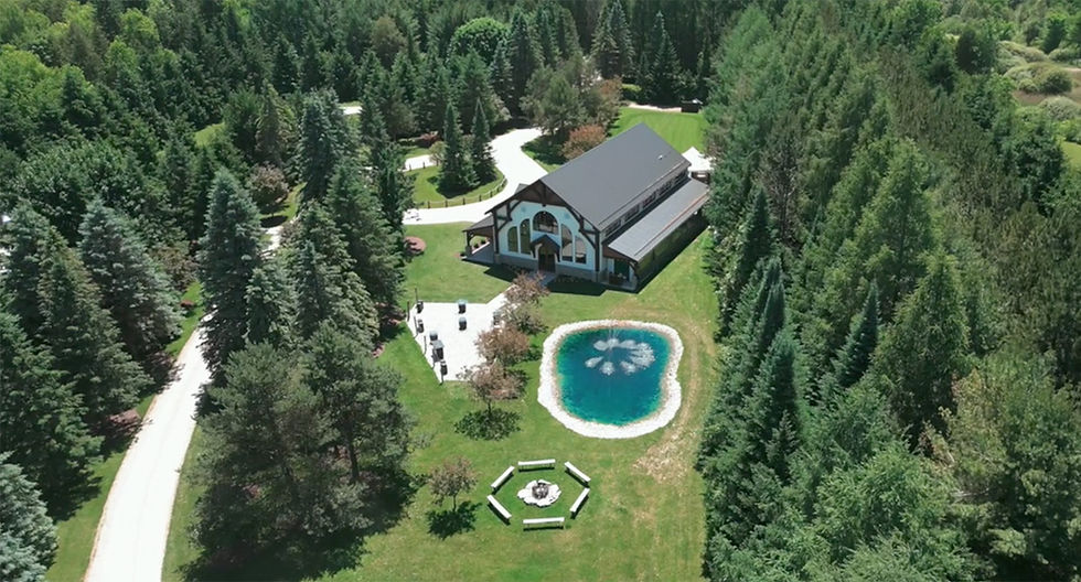 Erin Estate wedding captured from an aerial view during an outdoor forest ceremony in Caledon.