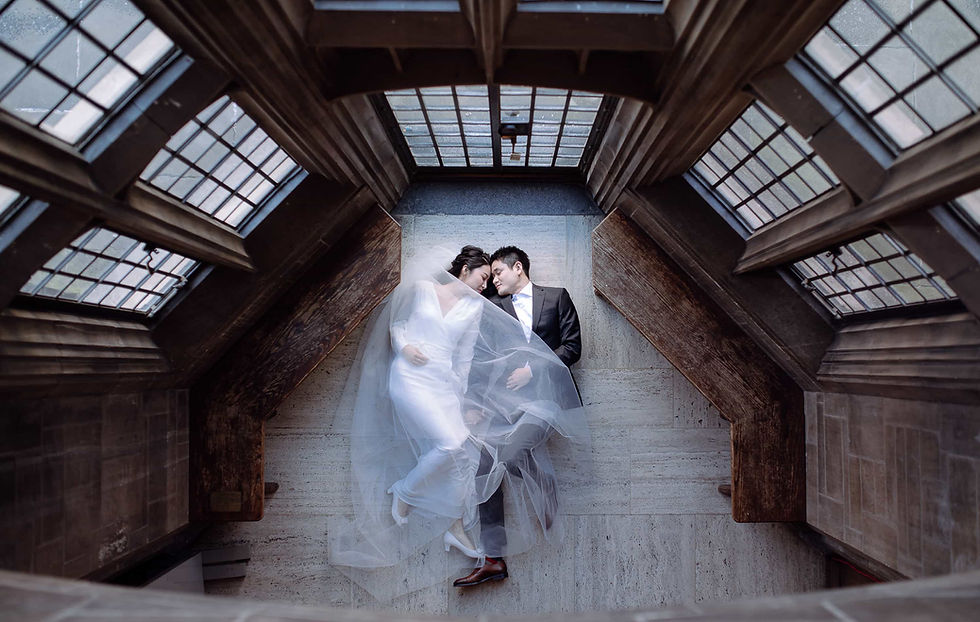Moody and historic wedding photography at Hart House Great Hall by a Toronto wedding photographer.