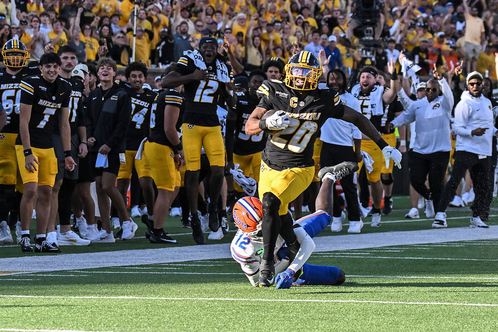 Jamal Roberts (20) file vers son touchdown de 80 yards face à Florida. Crédit photo : Rick Ulreich / Icon Sportswire.