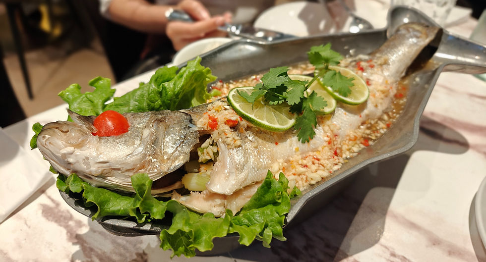 Steamed fish with garlic, chili, cilantro, and lemon sauce at Wondee Siam