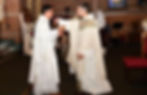 Father Vianney is embraced by his brother priest and fellow Community of the Beatitudes member Father Anthony Ariniello. (Photo provided)