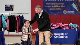 Annunciation student receives golden one millionth coat in Knights of Columbus giveaway