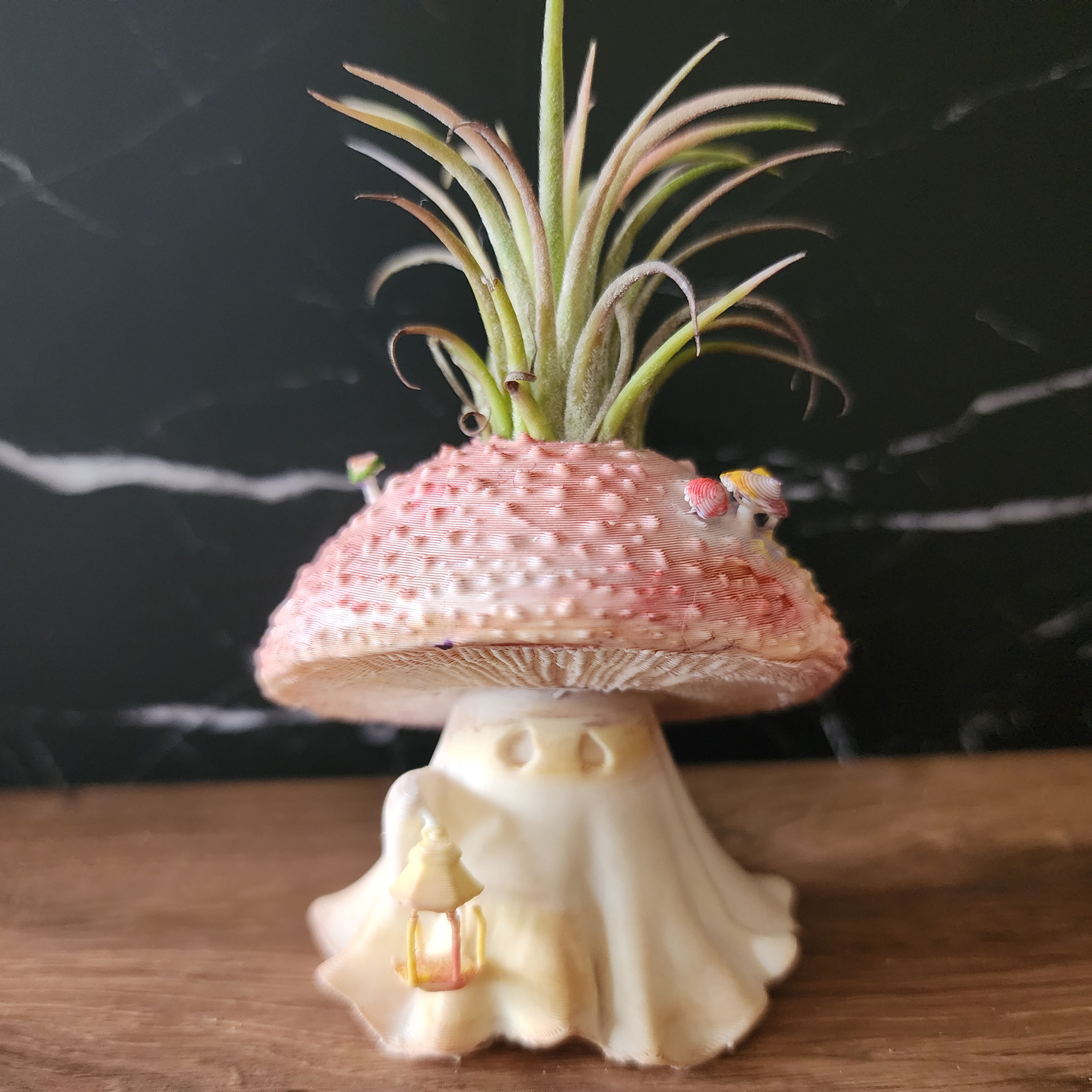 Mycel 001 hand-finished Bloom Sprite with pink mushroom cap, lantern and living air plant