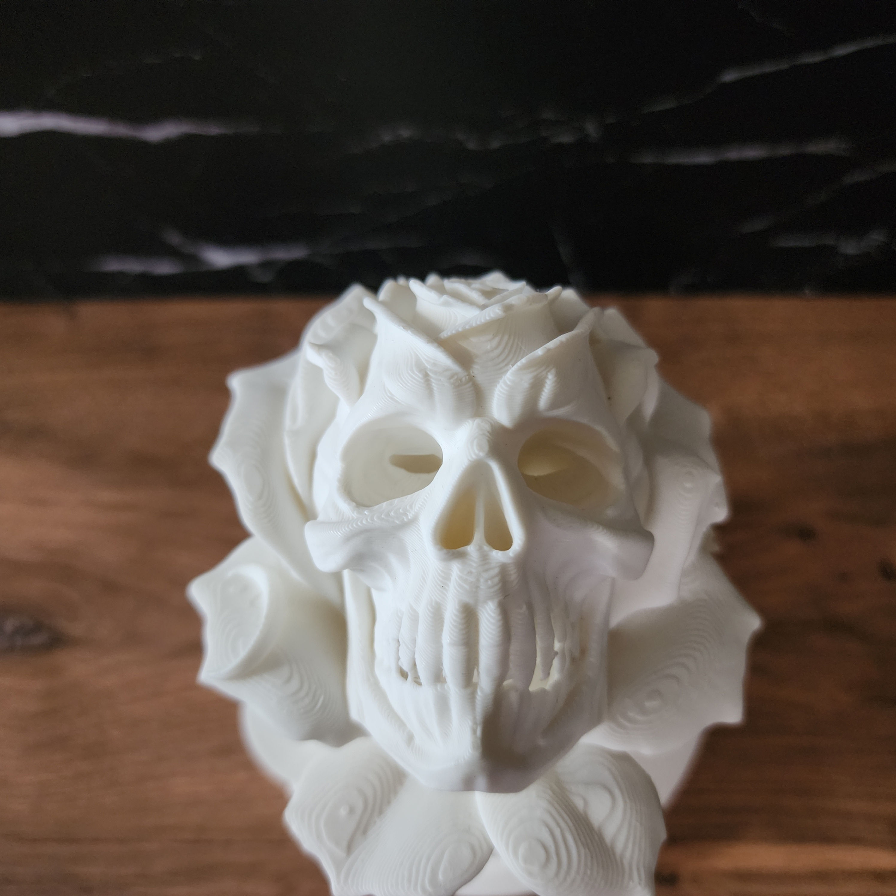 Grim Rose white Bloomstone with skull emerging from a large sculpted rose