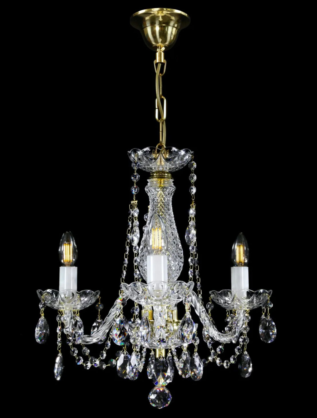 Farrah-3. Bohemian lead crystal chandelier. Small 3 arm chandelier adorned with lead crystals & crystal chains. Gold.