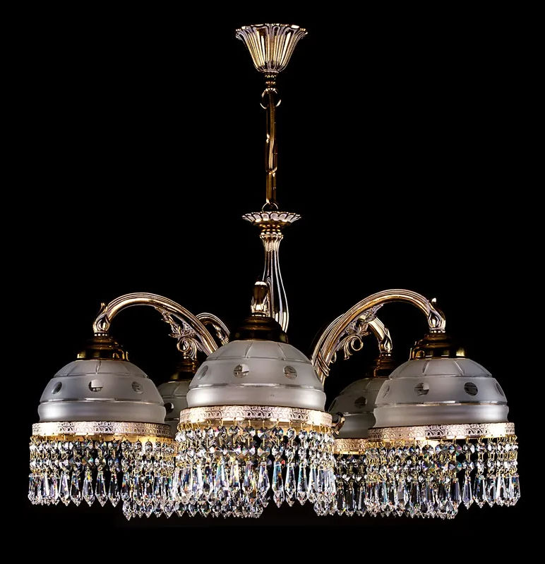 The Cassandra-5WG is a timeless Bohemian chandelier featuring an ornate cast White and Gold  frame and frosted glass shades.