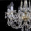 Thumbnail: Anja-8 is a 30% PbO crystal chandelier featuring rope twist glass arms, ornate glass bobeches, and opaque glass candle tubes.