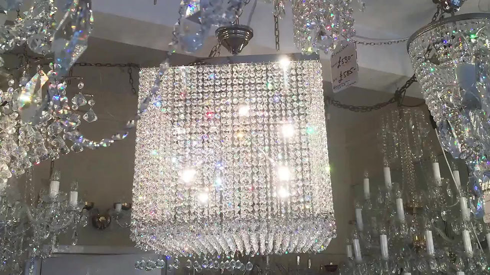 Thumbnail: Leandra-2 is a modern chandelier designed to impress. Its shimmering 30% lead crystal chains and icicle drops reflect light.