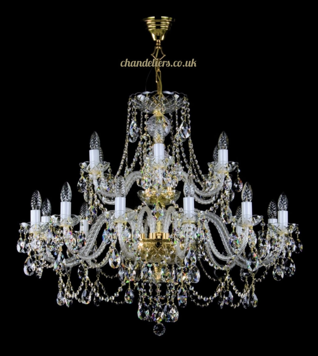 Andrea-18 chandelier set on 2 tiers. This large traditional 30% lead crystal chandelier boasts oval-shaped bohemian crystals
