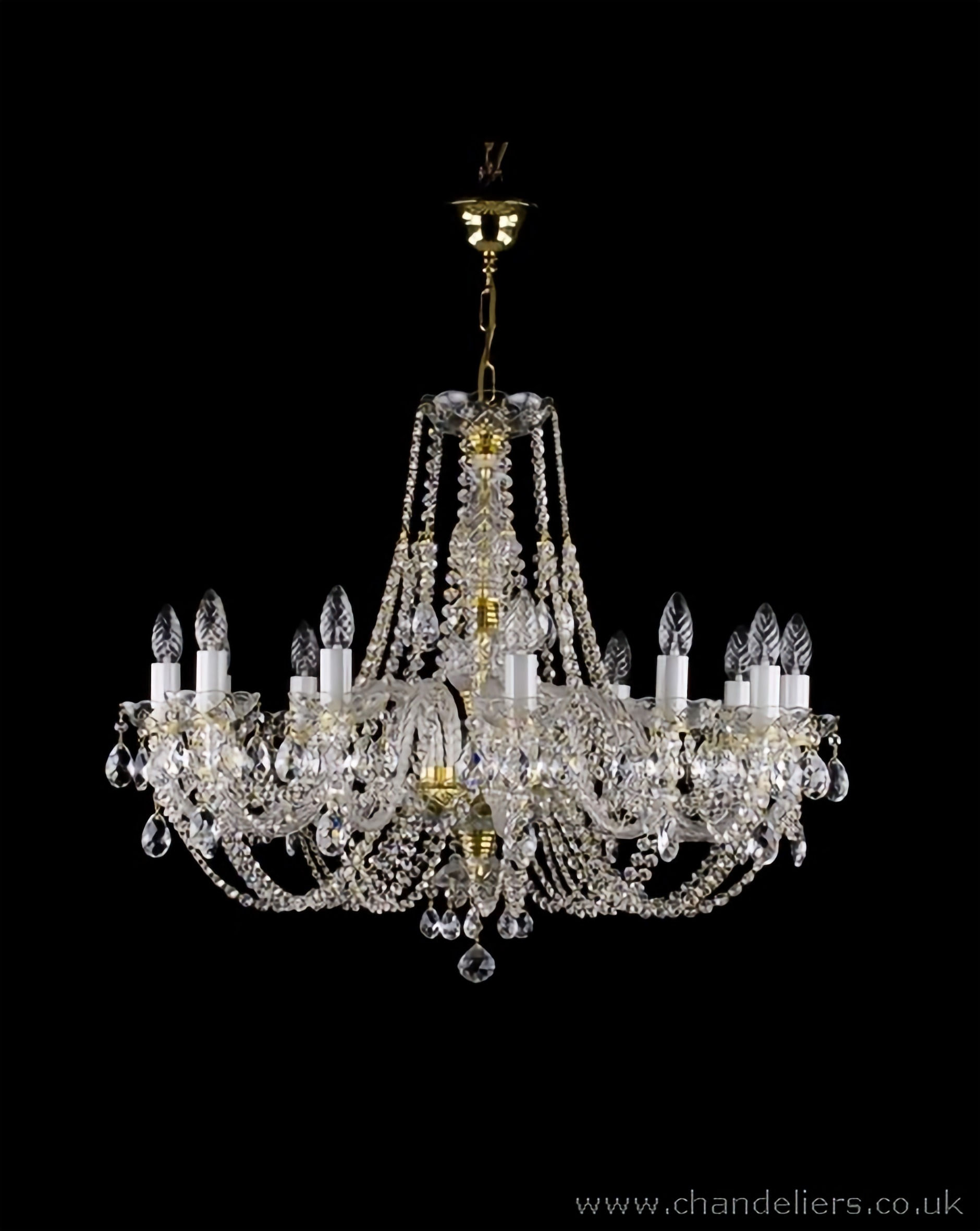 Classical 30% lead crystal chandelier with rope twist glass arms, ornate glass bobeches, and opaque glass candle sleeves.