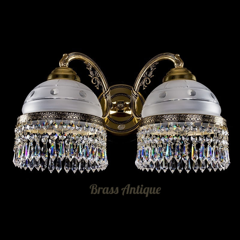Thumbnail: Karat-2. Brass Antique cast wall sconce. Elegant design with an ornate frame, smoked glass ornate shade & 30% PbO crystals.
