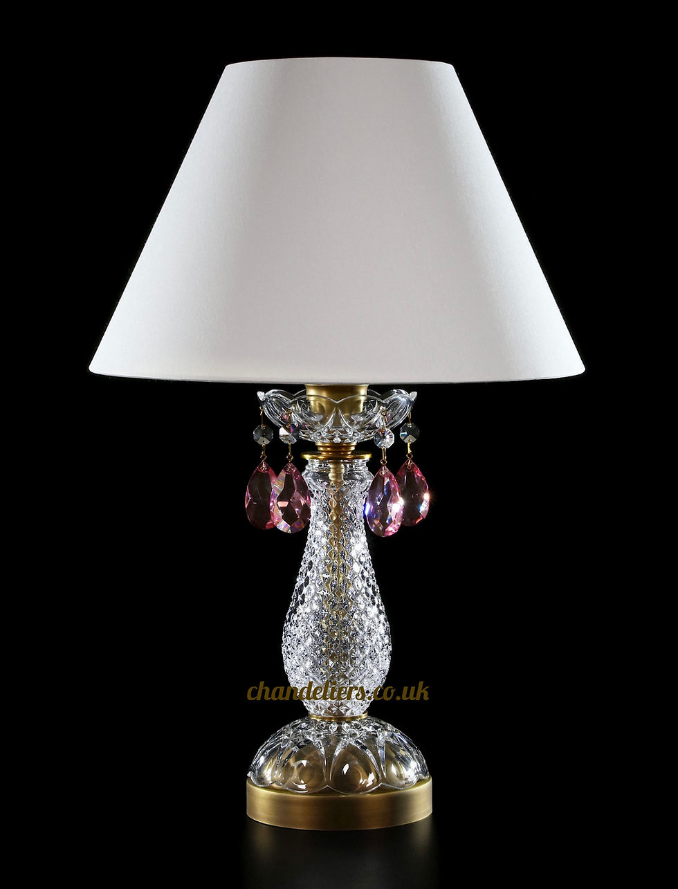 Farrah-LP1001,  30% PbO crystal table lamp adorned with oval-shaped pastel pink crystals and a delicate light patina finish.