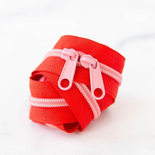 red and pink zipper roll