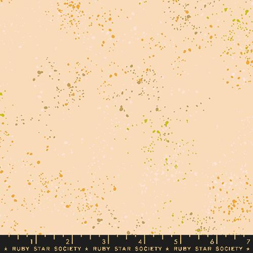 Tan and speckled fabric