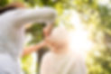 woman-doing-an-haircut-to-her-grandmother-outdoor-MP26AYU.jpg