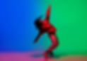 female hip hop dancer on blue/green background