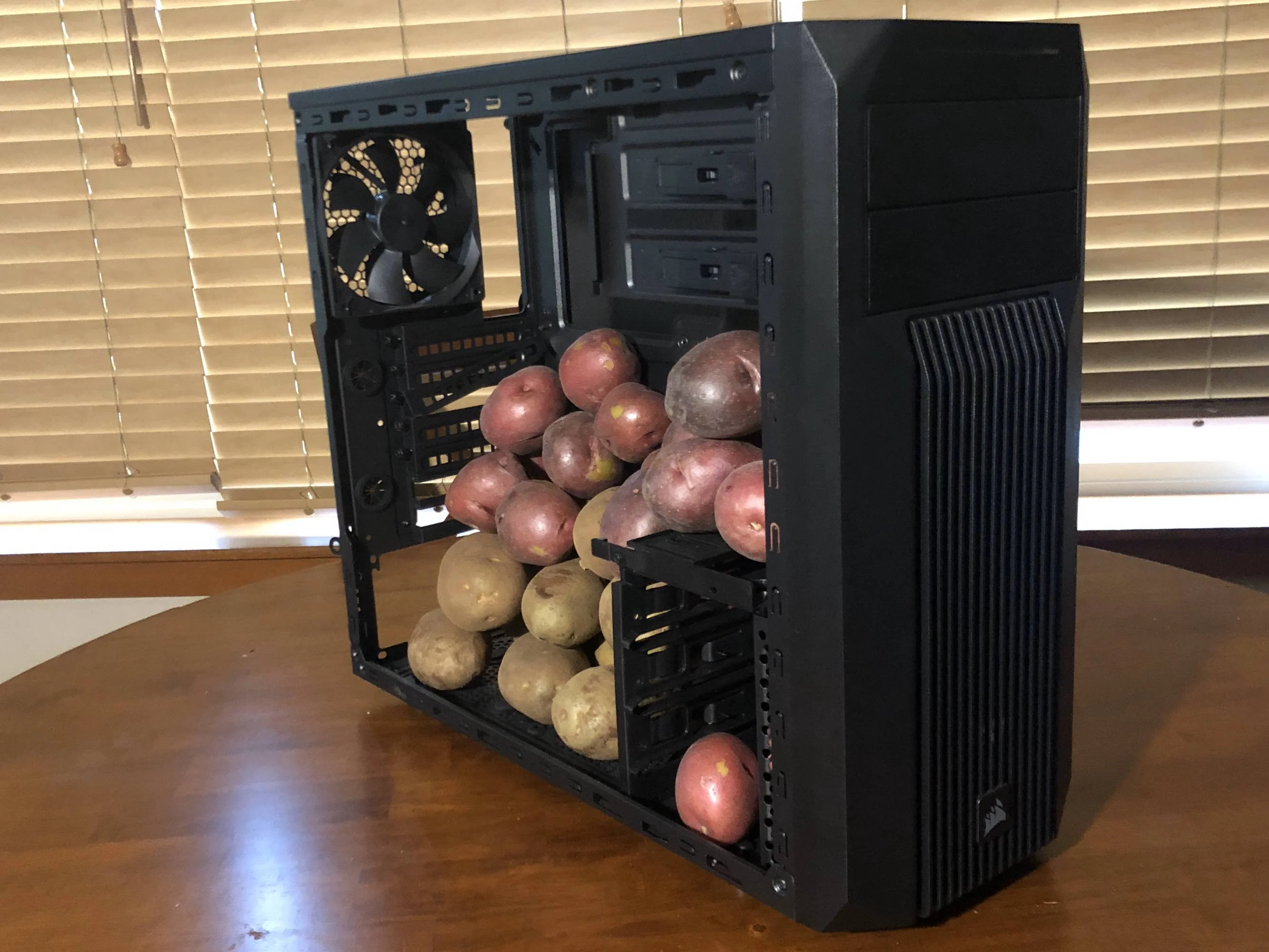 Computer case filled with potatoes