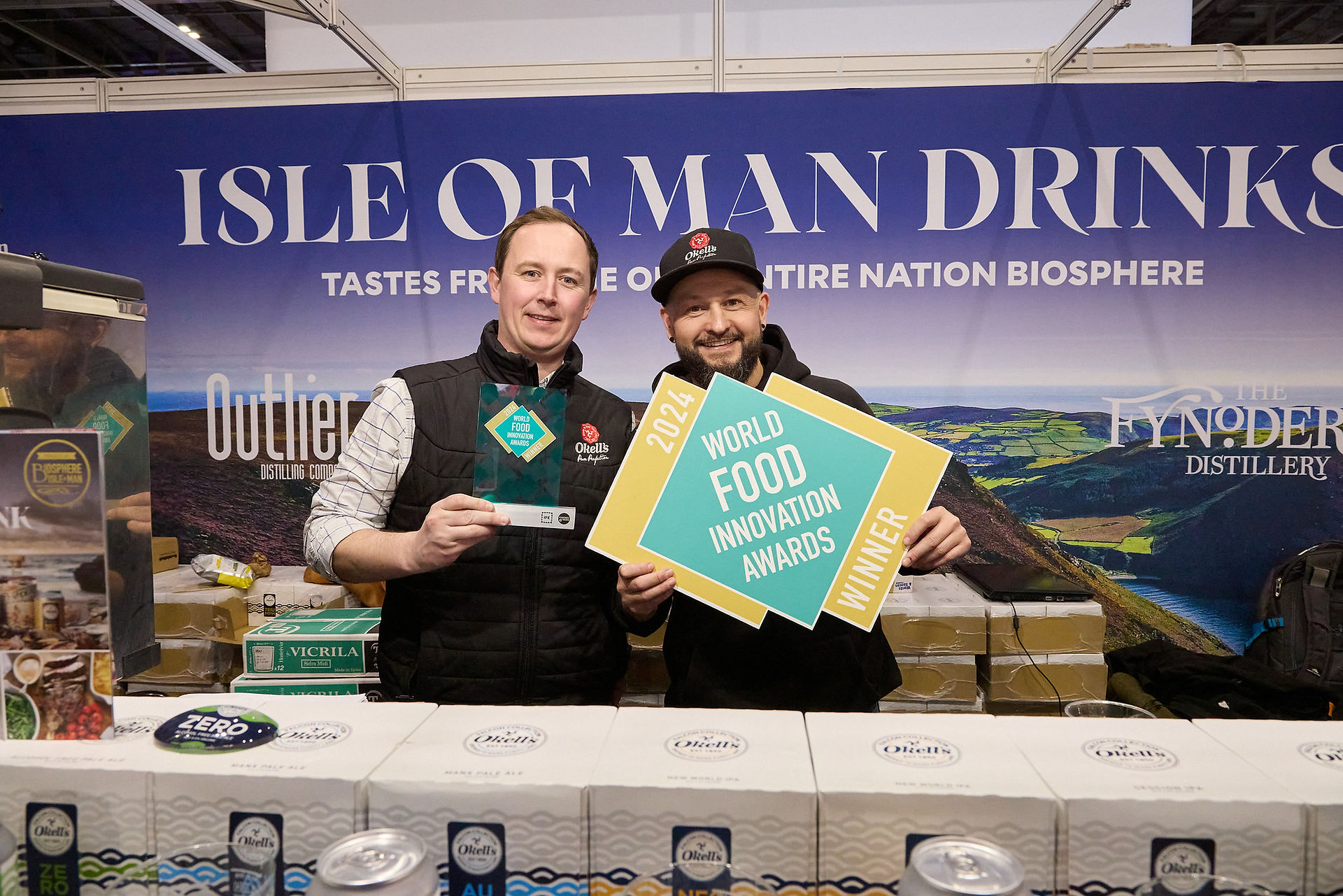 Okell's Brewery's Okell's ZERO, Winner of Best Low or No Product at the World Food Innovation Awards 2024 celebrate at their IFE stand