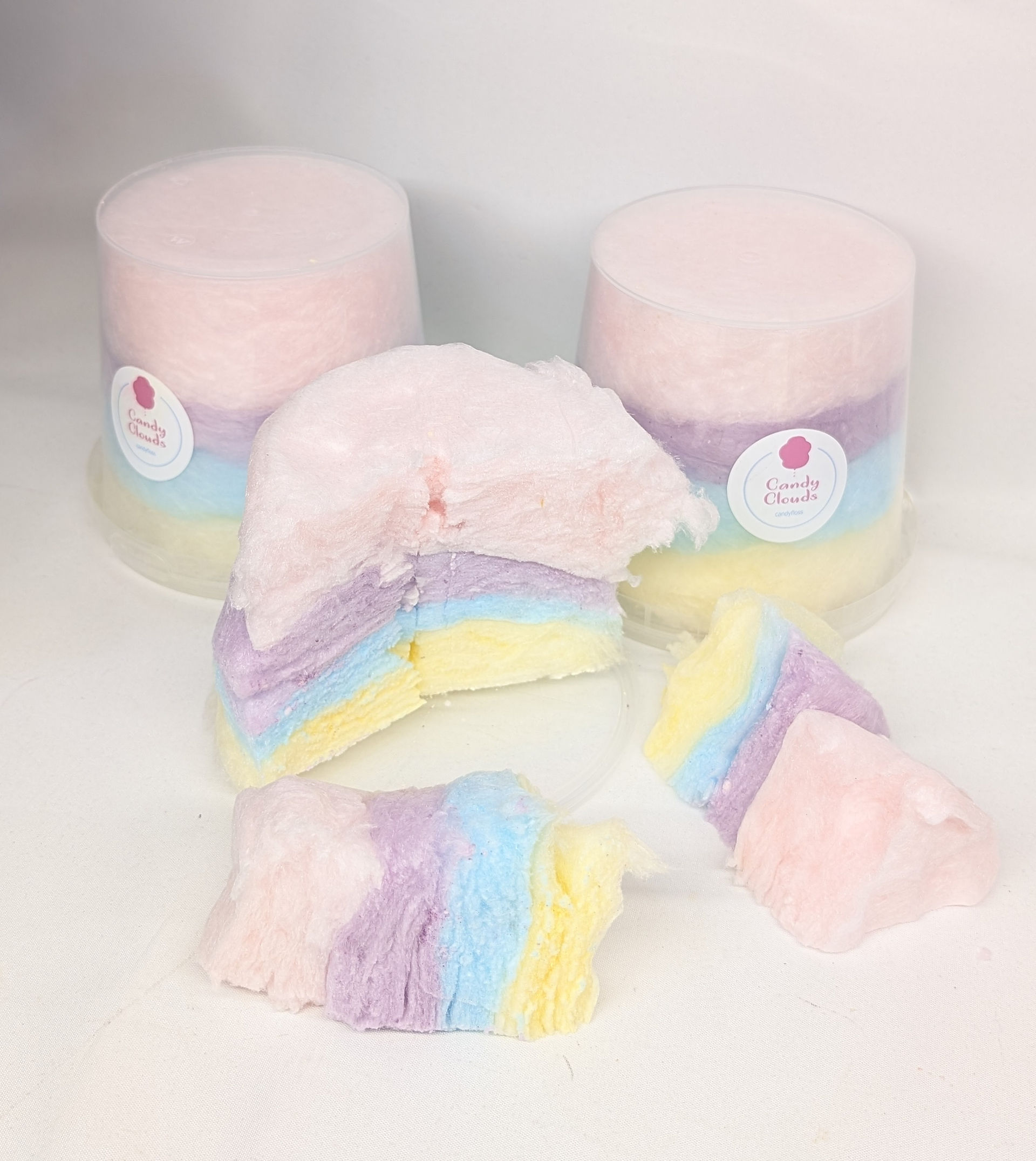 Candy floss cakes feature rainbow flavors, customizable sizes, and are allergy-friendly.