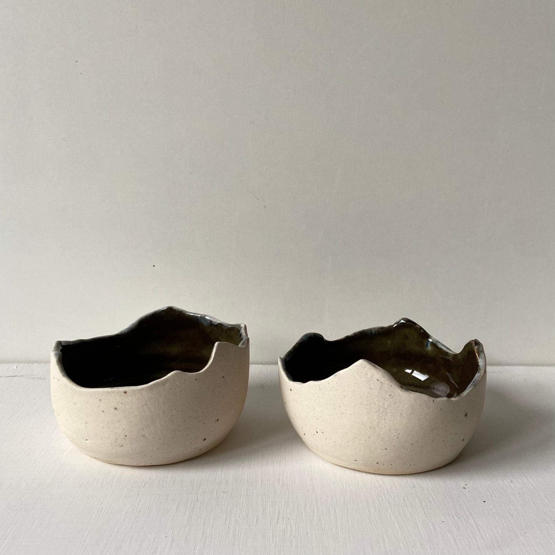 Small jagged bowl with speckled exterior