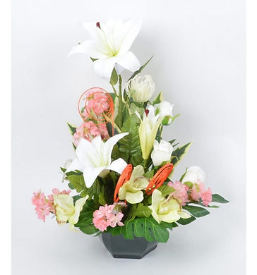 Fleurs blanches et oranges pour caveau tombe décoration cimetière