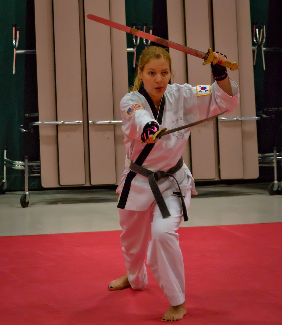 TKD near me - top TKD schools near me instructor with swords