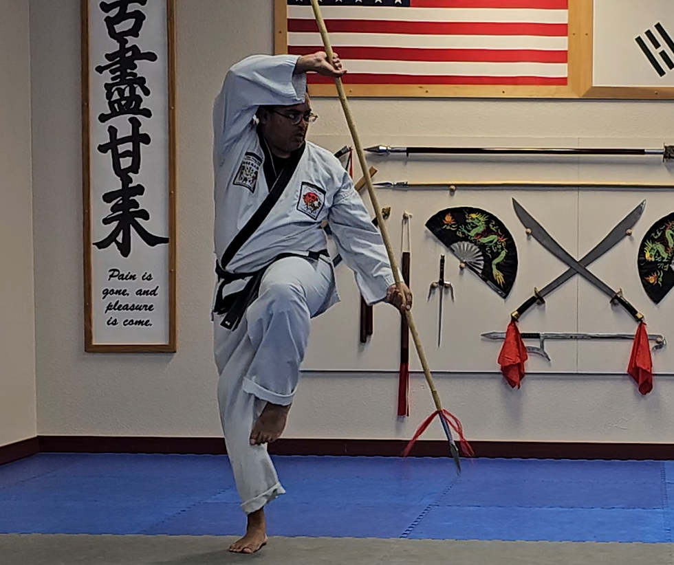 Karate near me - top karate martial arts instructor with weapons