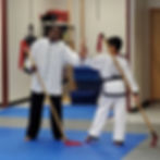Photo of master and student in top martial arts school in Kirkland