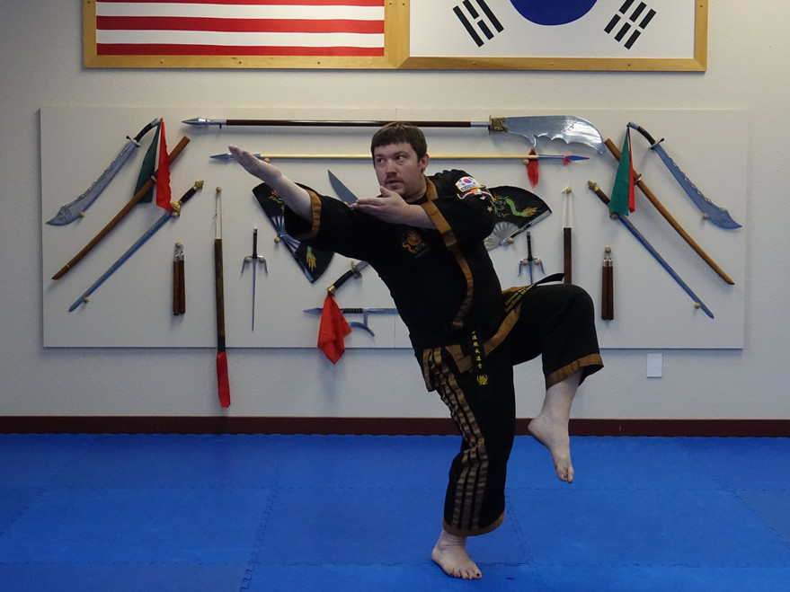 Martial arts near Kirkland - Kirkland martial arts instructor with weapon