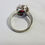 Thumbnail: STERLING SILVER RED GEMSTONE & CZ ROUND HALO RING
