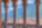 Old town of Trento viewed from an arcade in Castello del Buonconsiglio, Italy..jpg