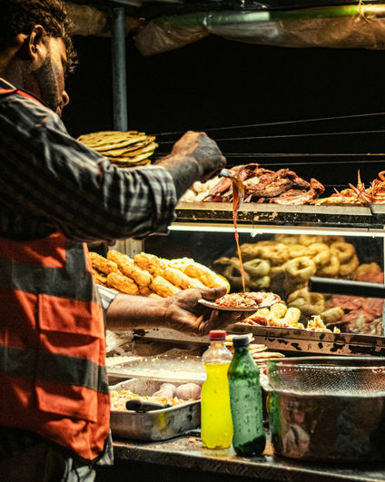 Local seafood vendor preparing fresh catches along Sri Lanka's southern coastline