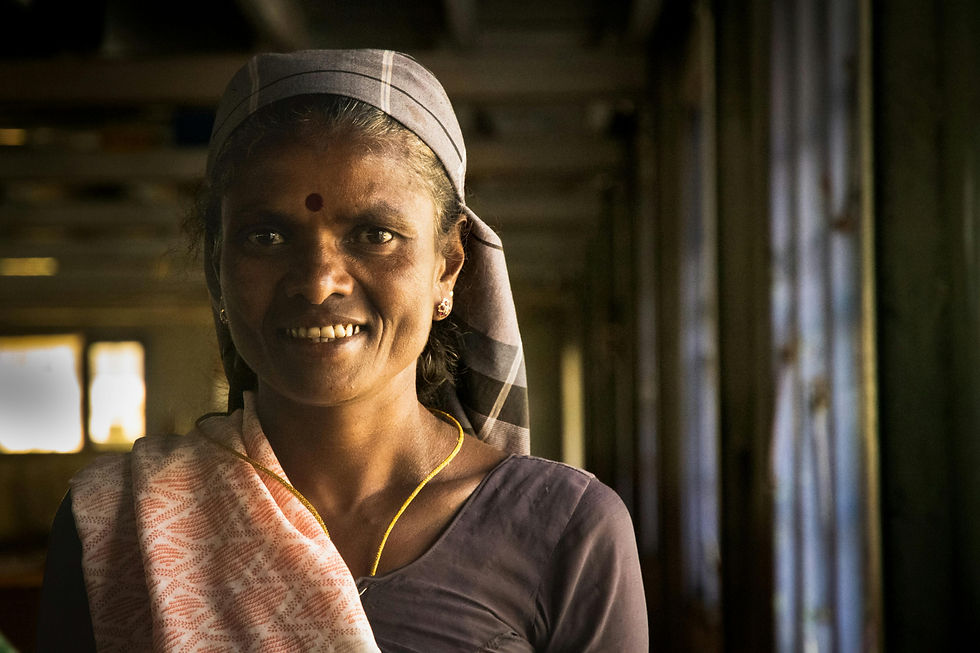 Portrait of a smiling local Sri Lankan woman in traditional village surroundings
