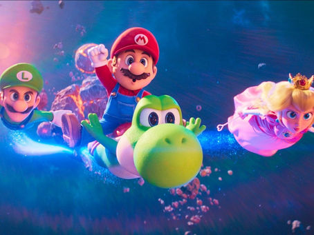 Animated characters Mario, Luigi, Yoshi, and Princess Peach, in colorful outfits, fly through a vibrant space-like scene with asteroids.