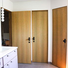 Custom White Oak interior  doors. Emtek.
