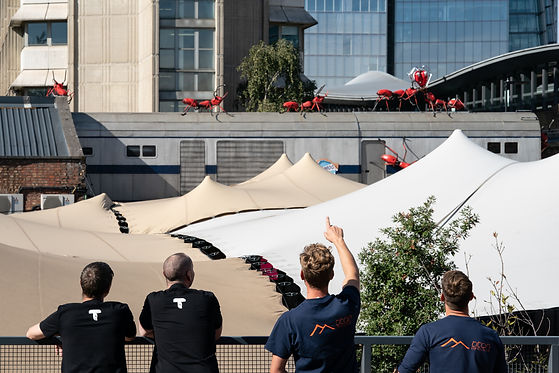 Titan Tents team surveying stretch tents ahead of planned maintenance