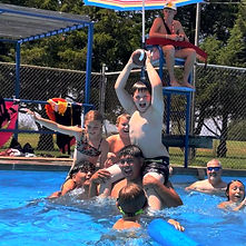 Campers playing in pool