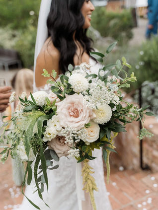 modern, untamed, highly textural bridal bouquet in white and green colour palette, incorporating Quicksand rose, white dahlia, Matthiola, Ammi Majus and other flowers and grasses