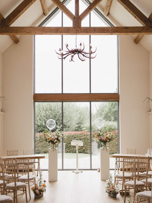 wedding ceremony flowers at Millbridge Court