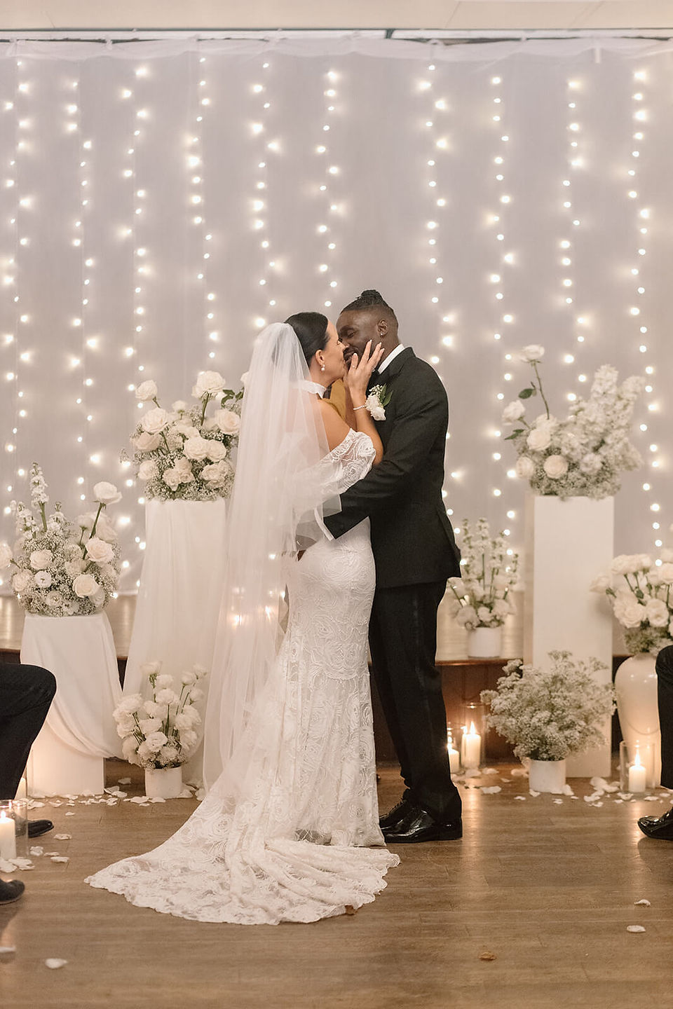 Elegant Drayton Court Hotel wedding ceremony with white floral plinth arrangements