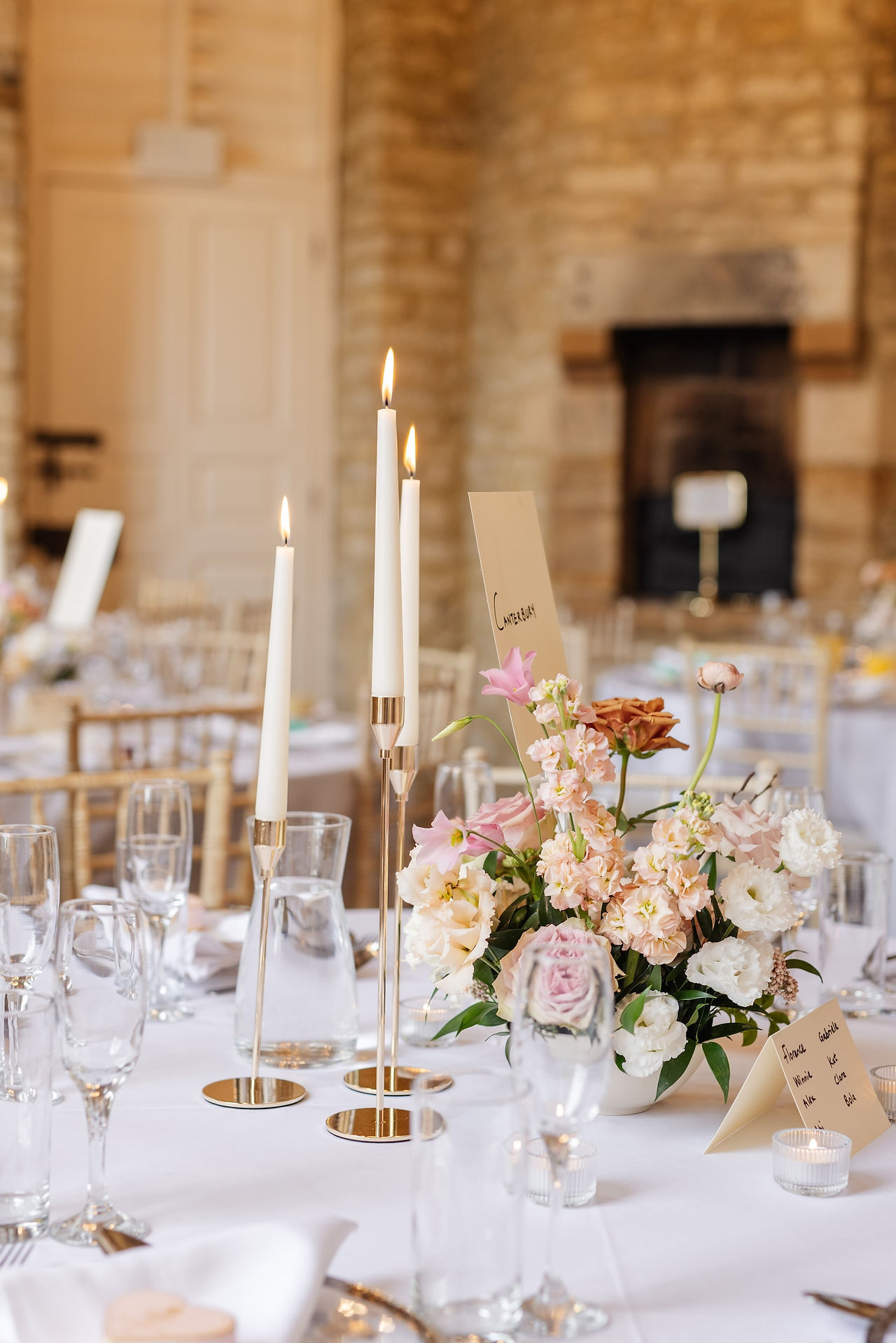 Modern, textural, pastel wedding centrepiece at the wedding reception at Hinwick House