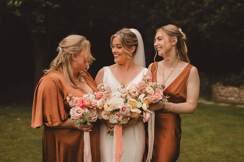 stunning, peach, pink and cream bridal and bridesmaids' bouquets