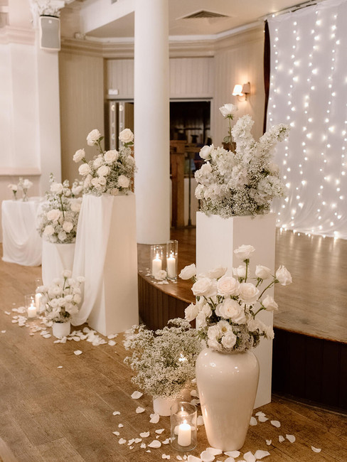 Drayton Court Hotel wedding ceremony flowers with white textural florals and soft draping