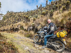 Honda XRE300 dual-sport beside frailejones in Colombia’s high-Andes páramo during an off-road ride.