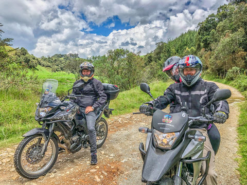 Colombia motorcycle tours – adventure riders on Honda XRE300s in the Andes.