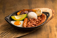 Traditional Bandeja Paisa meal in Antioquia, Colombia.