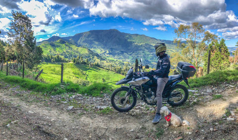 Medellín motorcycle tour – Honda XRE300 rider in Colombia’s coffee countryside.